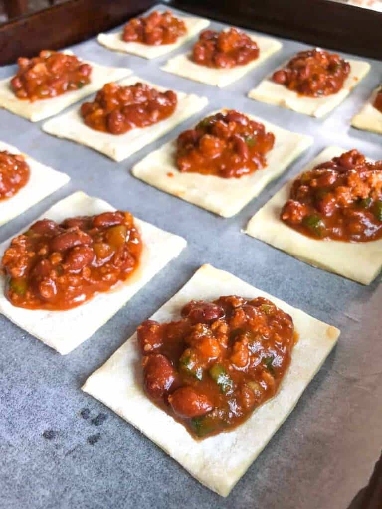 puff pastry squares topped with Hormel chili