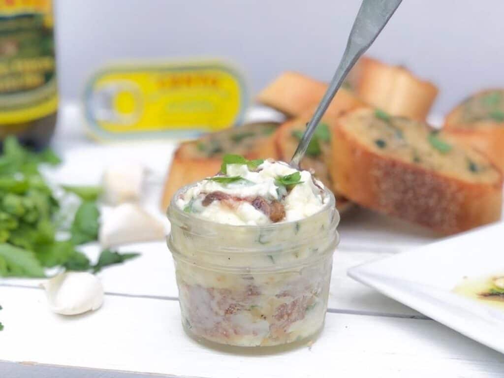 Garlic bread spread in a mason jar.