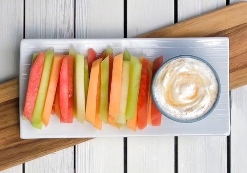 fruit fries arranged on a plate with yogurt dip