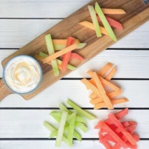 melon cut into sticks with yogurt dip