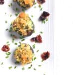 kale and cream cheese stuffed mushrooms on a plate
