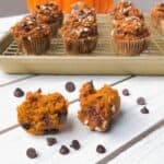 pumpkin pie mini muffins with chocolate chips on a table