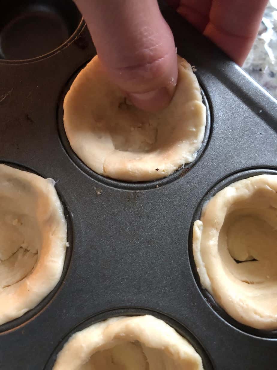 biscuit dough in muffin tin.