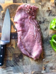 Steak seasoned with salt and pepper.