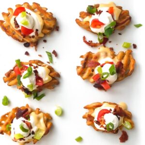 overhead shot of Irish waffle fry nachos on a plate