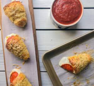 Stuffed pizza dough shaped into a cone