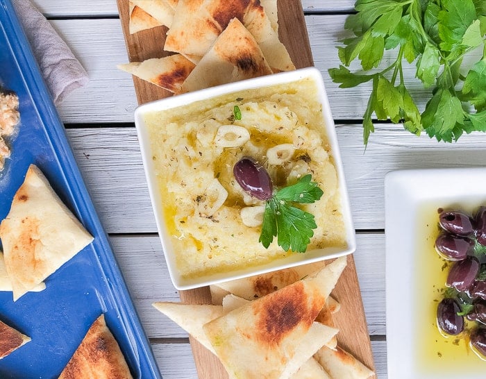 Greek potato dip with pita bread on the side.