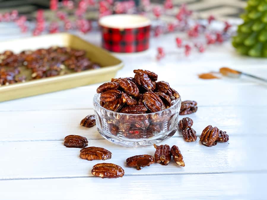 Cinnamon brown glazed pecans in a bowl.