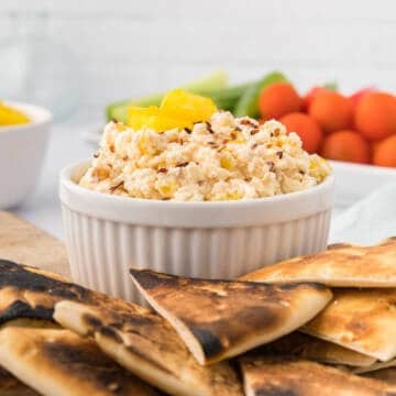 Spicy feta cheese with pita bread triangles.