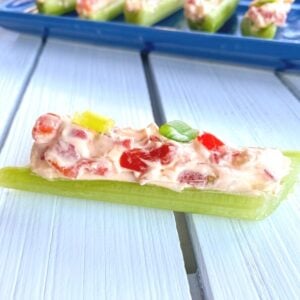 pimento cream cheese stuffed celery sticks on a table