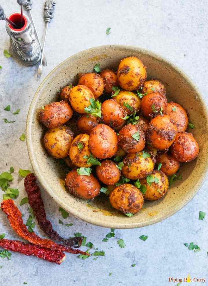 easy instant pot appetizer potatoes with seasoning on top in a bowl