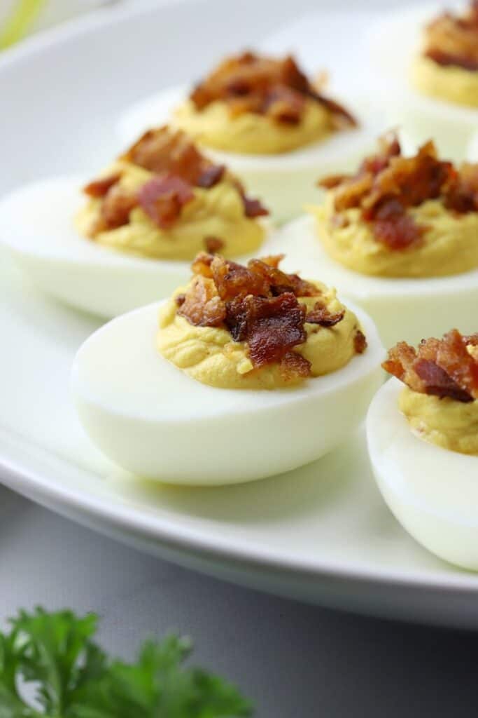 bacon deviled eggs appetizer on a plate