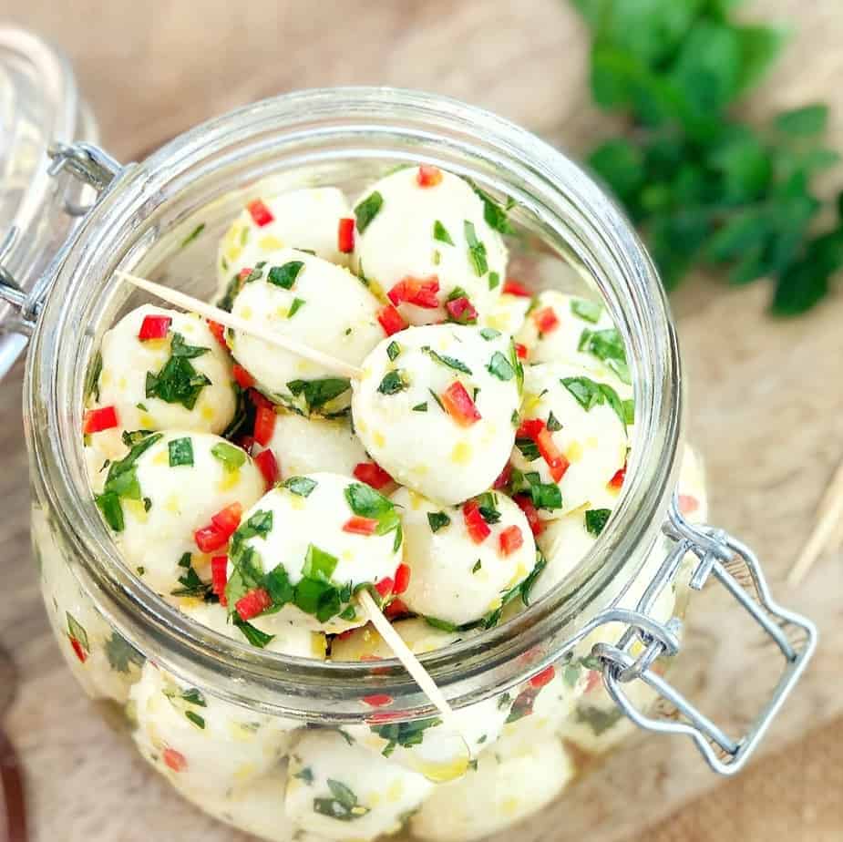 marinated mozzarella balls appetizer in a jar
