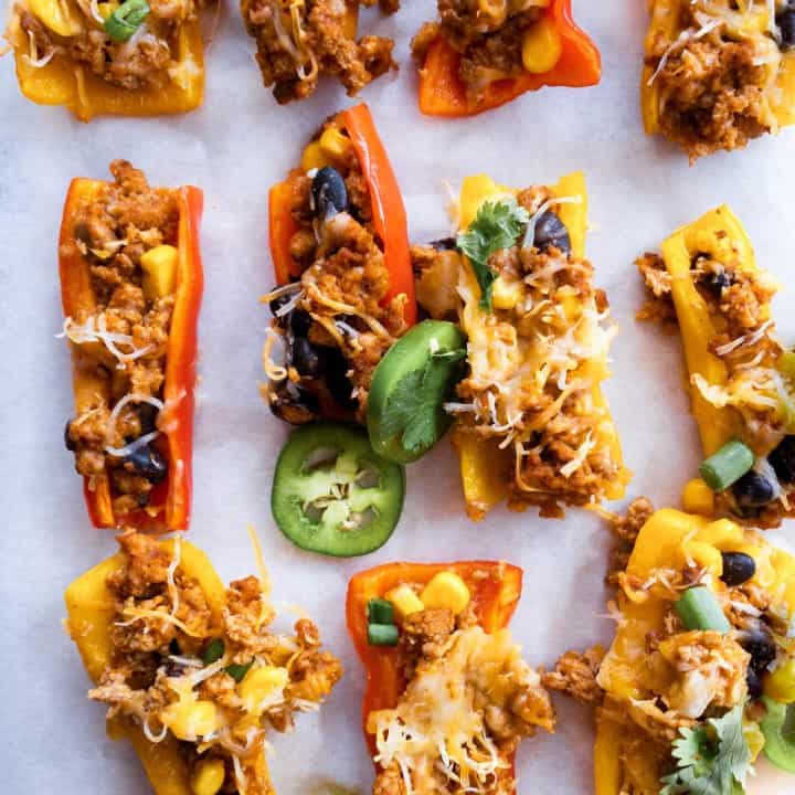 yellow and orange stuffed mini peppers appetizer with ground turkey