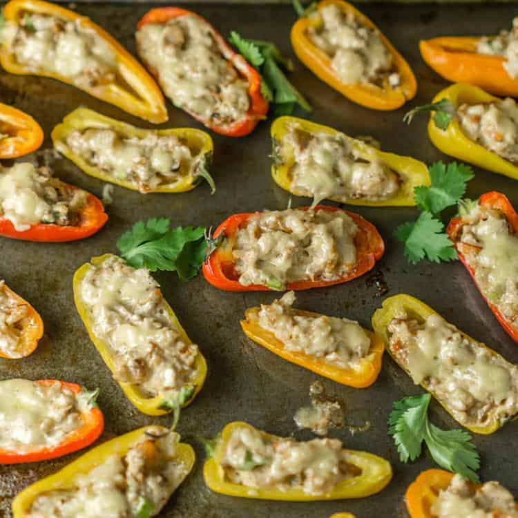 baked shrimp and bell peppers stuffed appetizer on a baking sheet
