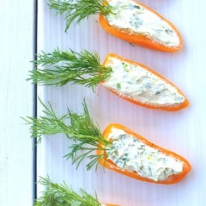 orange mini peppers stuffed with cream cheese on plate