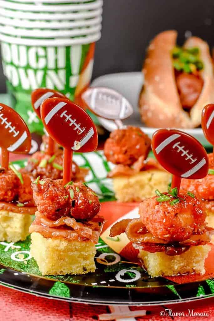 chicken and bacon cornbread bites with football skewer.
