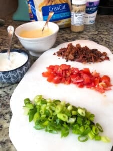 Chopped ingredients with dip on the side.