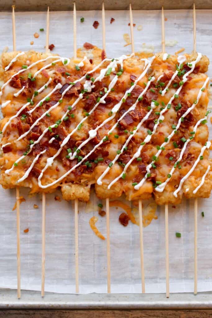 skewered tater tot kabobs on a plate.