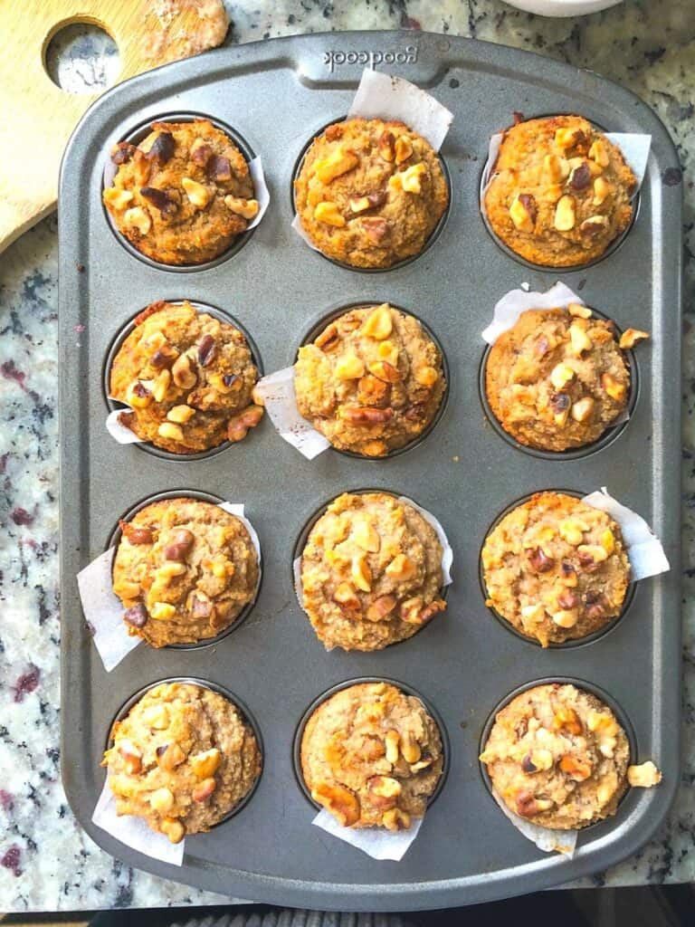 mini banana walnut muffins with honey in a muffin tin