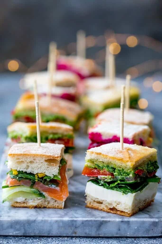 mini fresh pressed sandwiches with toothpick skewers.