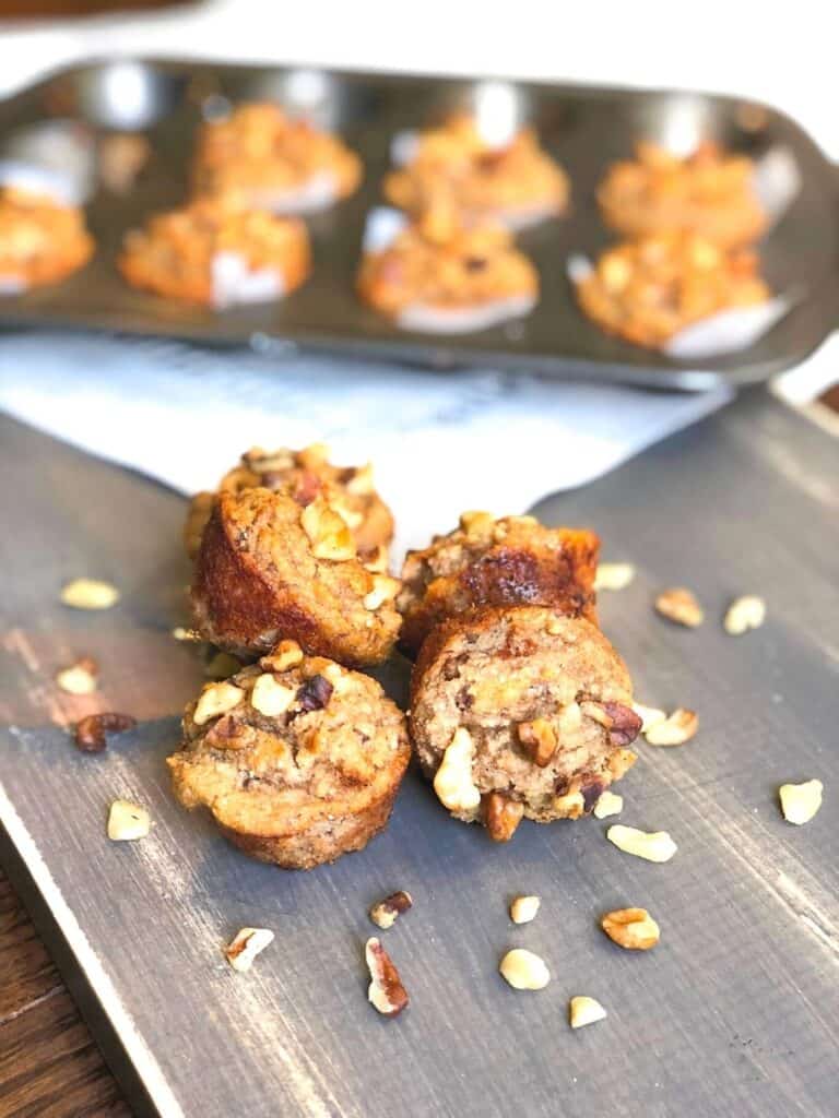 mini banana walnut muffins on a table
