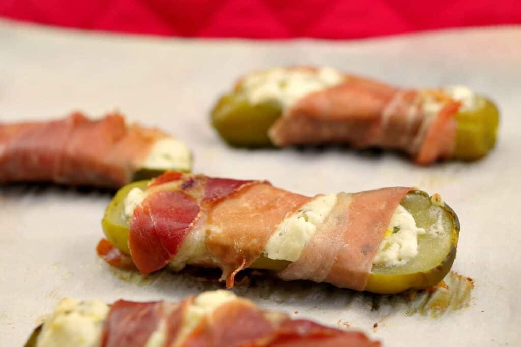 pickles stuffed with cheese and wrapped in prosciutto