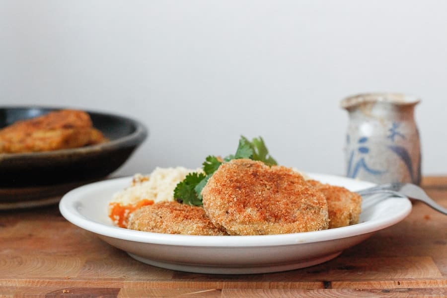 potato patties on a white plate.