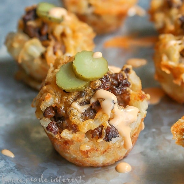 tater tots stuffed with meat and cheese.