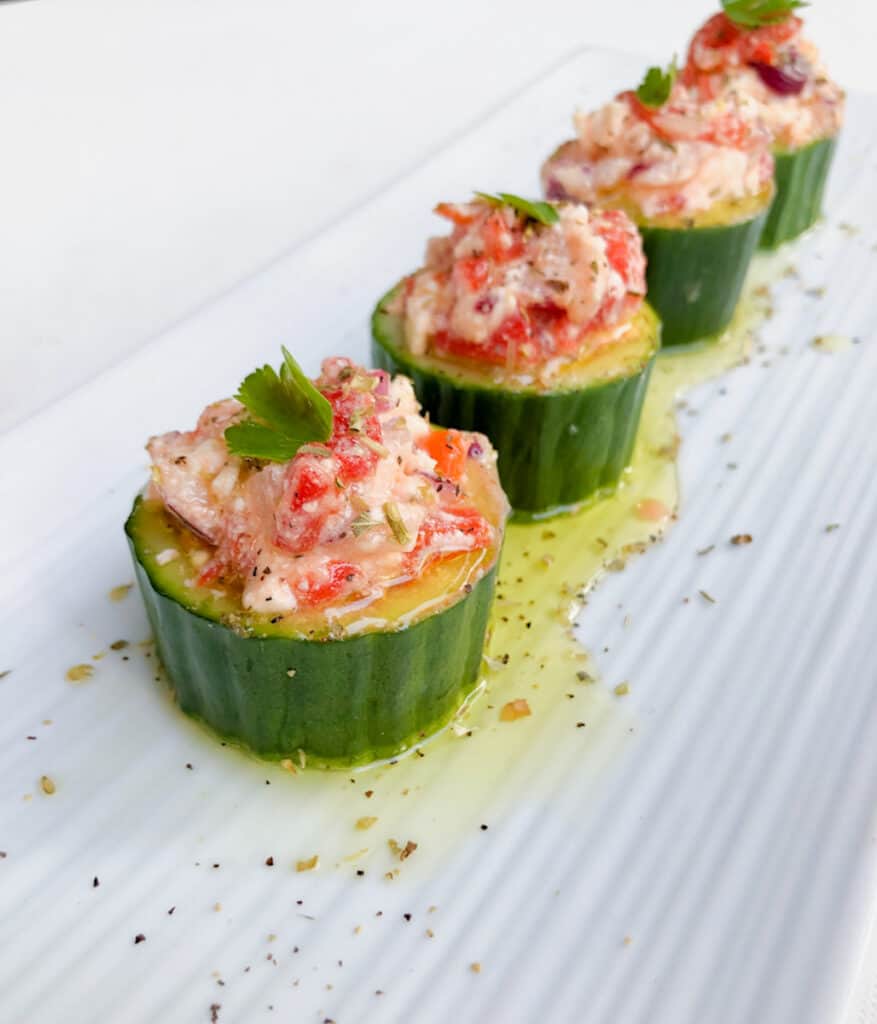 Greek cucumber hors d'oeuvres with feta and tomatoes.