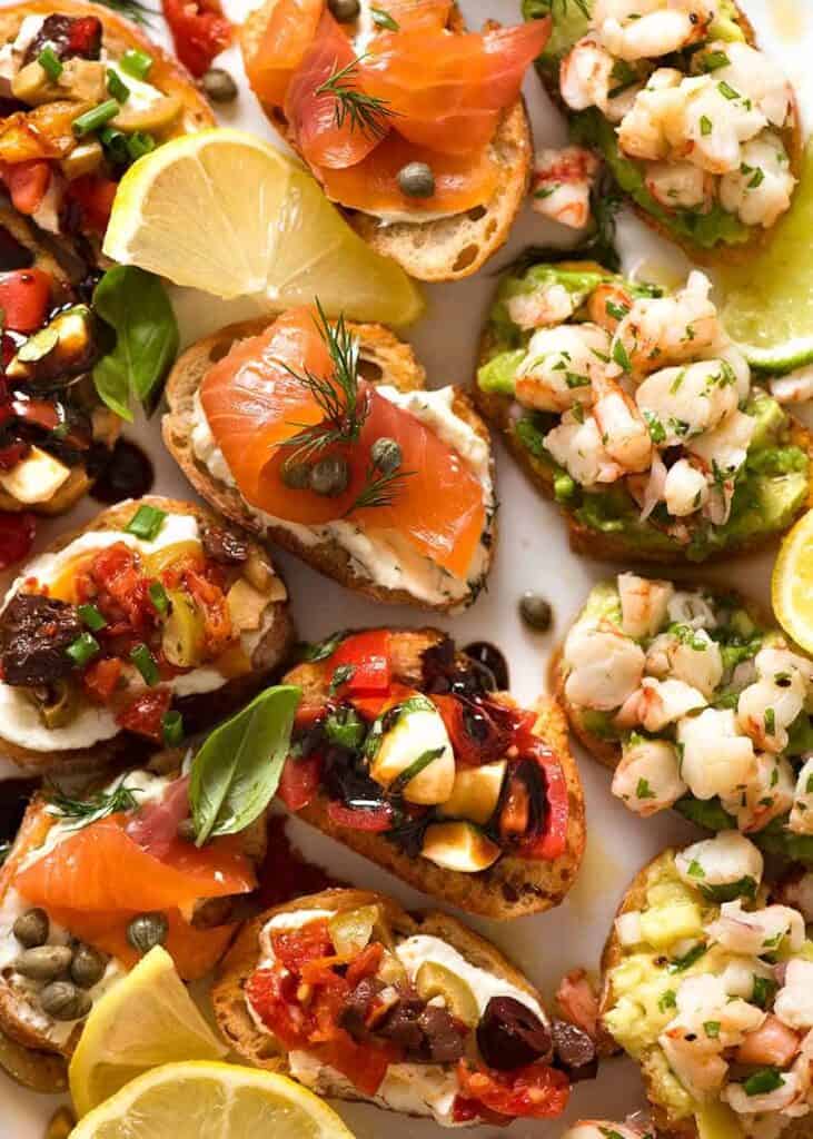 holiday crostini with salmon shrimp capers.