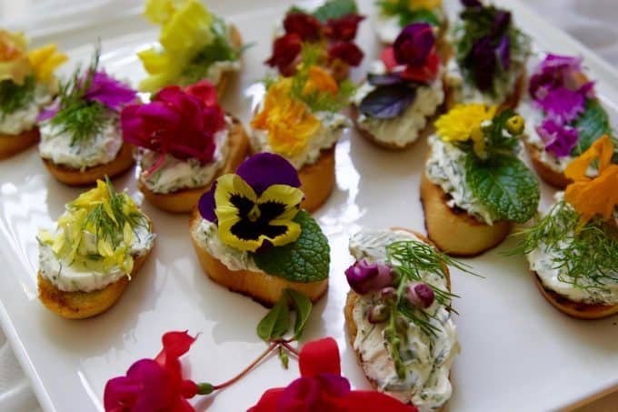 crostini with edible flowers and herbs.