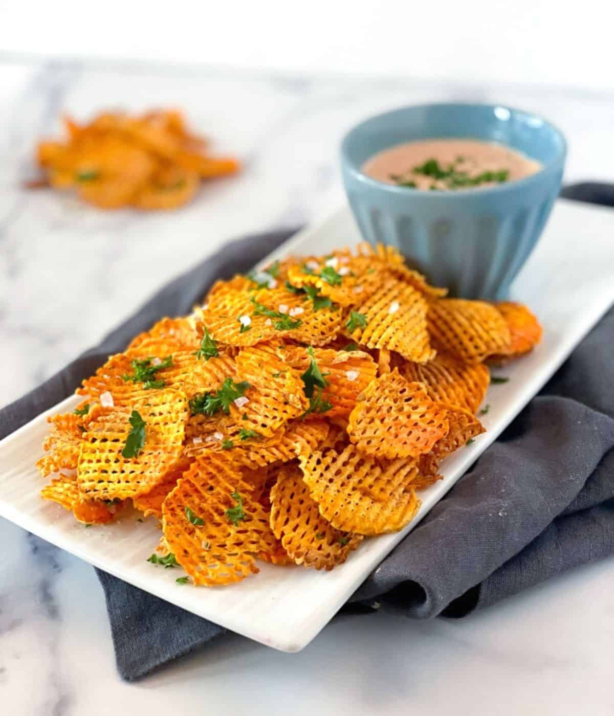 Sweet potato chips on plate.