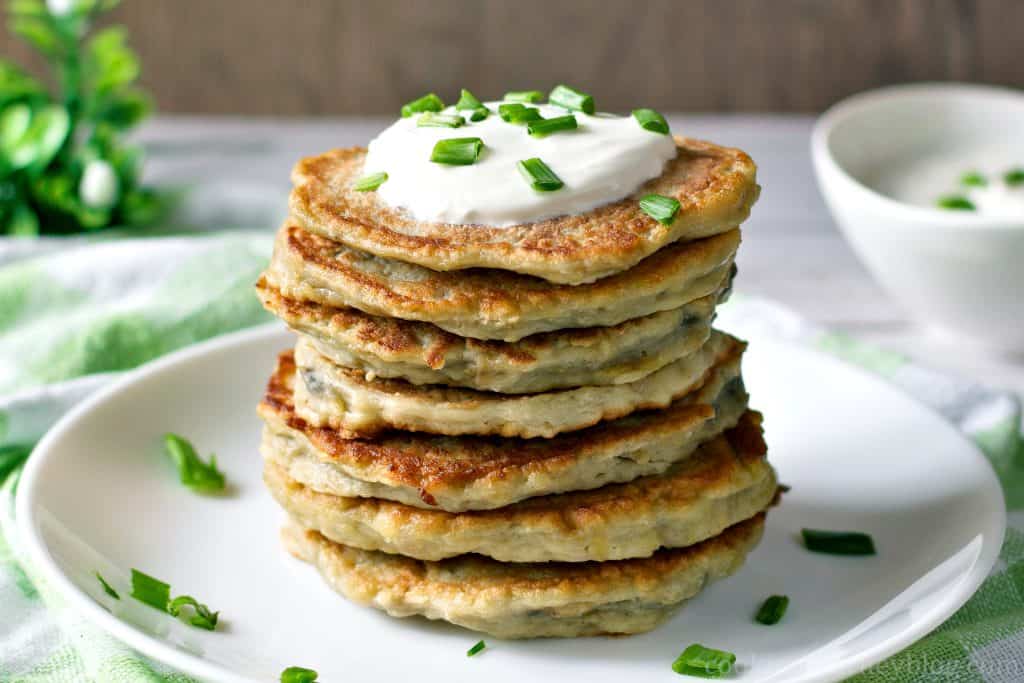 Boxty Irish potato pancakes with green onions and sour cream.