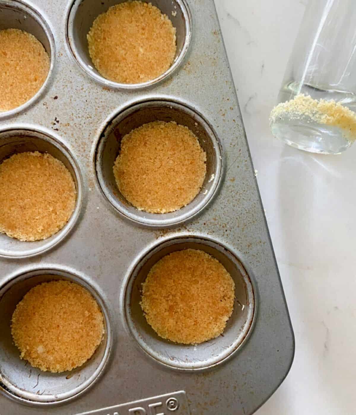 cookie crust in a muffin pan for mini cheesecakes.