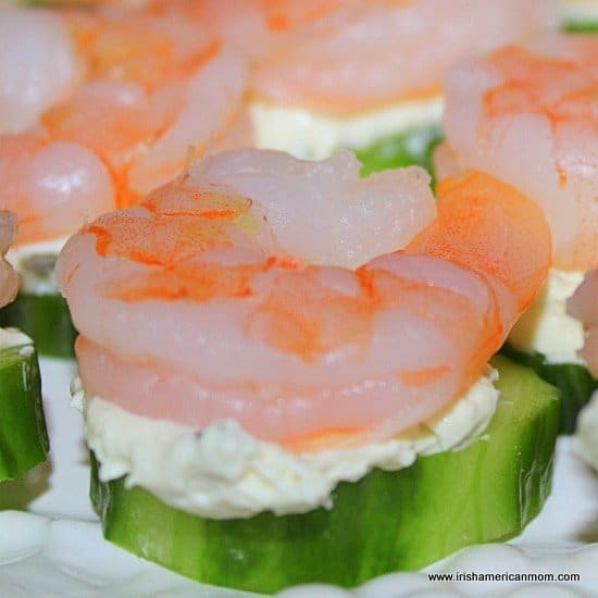 Shrimp on a slice of cucumber.