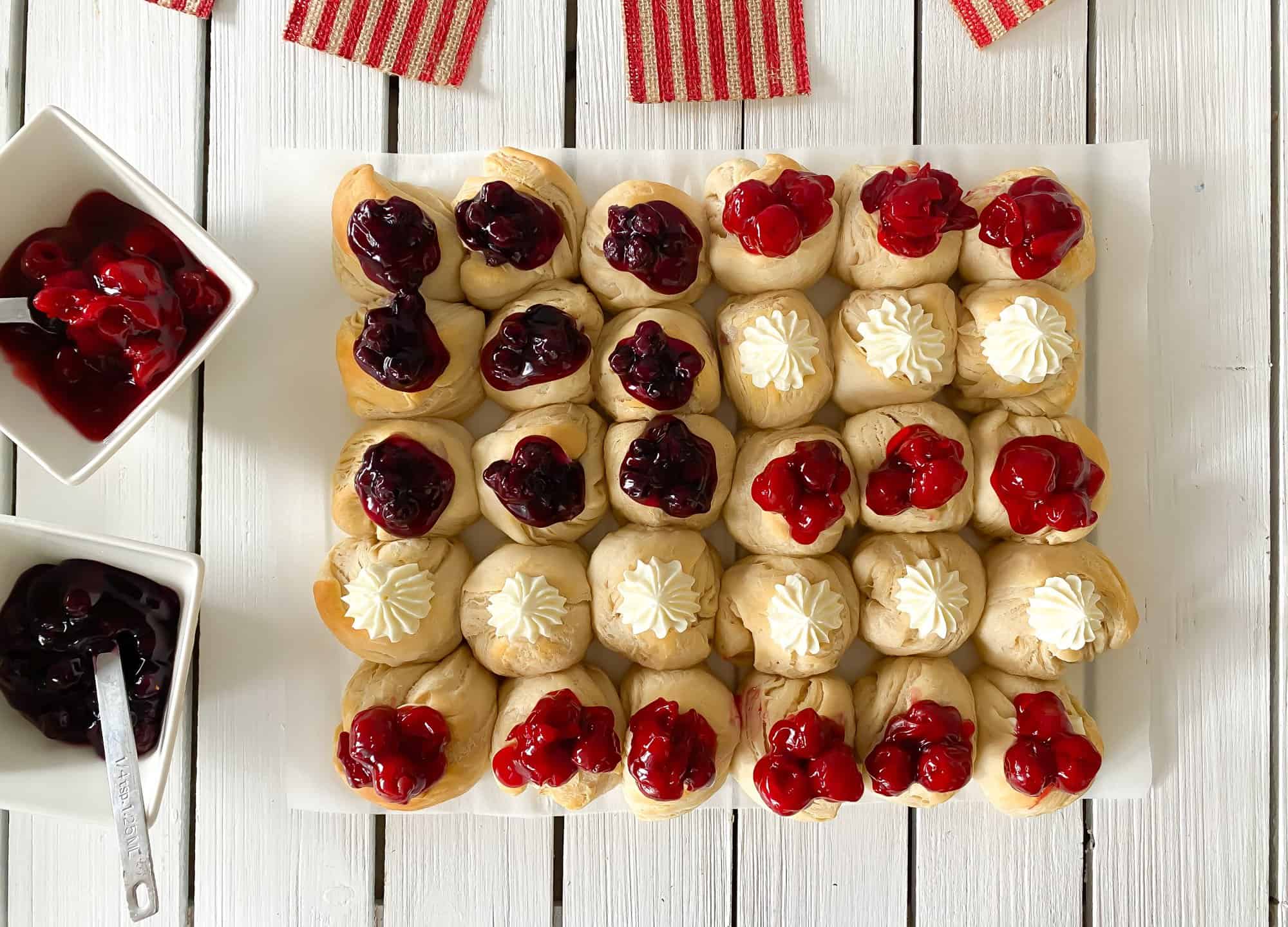 Patriotic American flag biscuit dessert with red, white and blue filling.