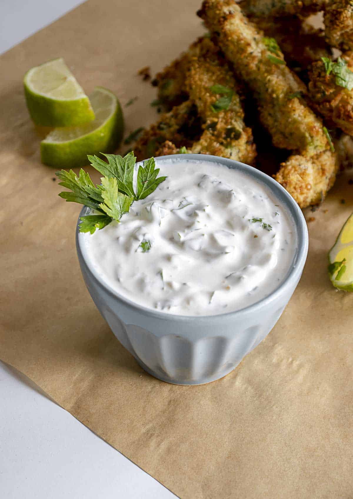 Close up of sour cream cilantro sauce.