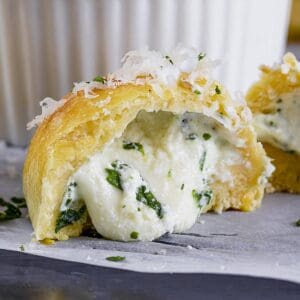 Mini calzone bites appetizer stuffed with cheese.