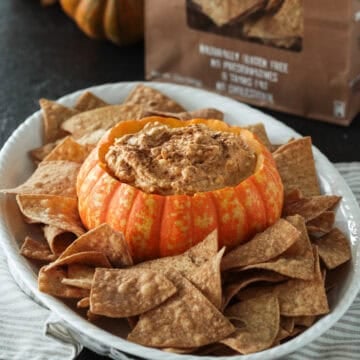 Pumpkin fluff dip with cream cheese in a pumpkin.