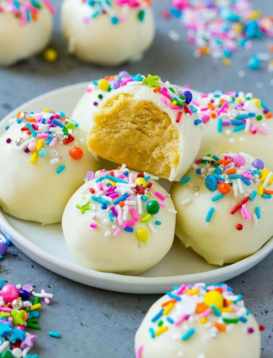 Cake bites with sprinkles on a plate. 