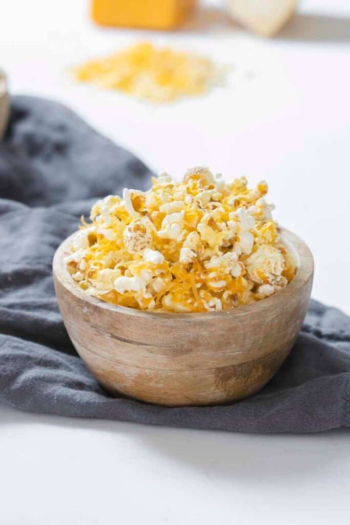 Cheesy cheddar popcorn in a bowl.