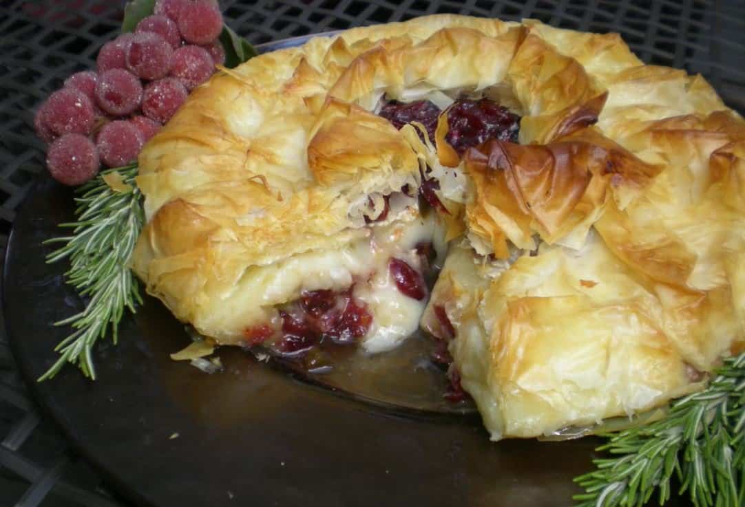 Phyllo wrapped baked brie with cranberries.