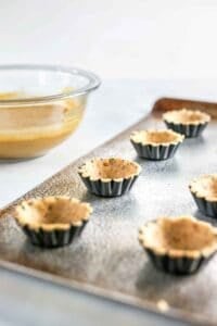 Dough in muffin tin.