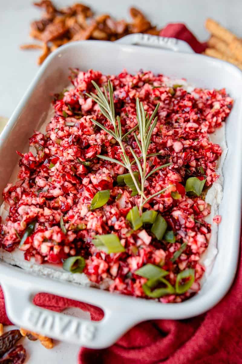 Cranberry jalapeno dip with rosemary on top.