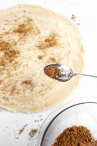 Pie crust sprinkled with brown sugar spice mix.