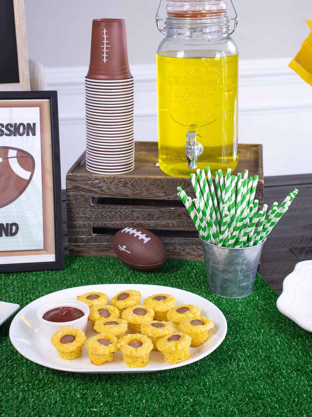 Super bowl table with gatorade and appetizers.