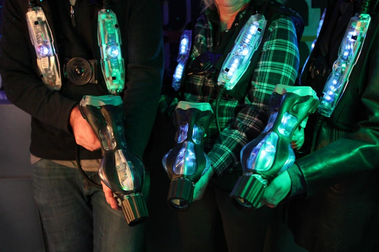 Players wearing laser tag equipment.