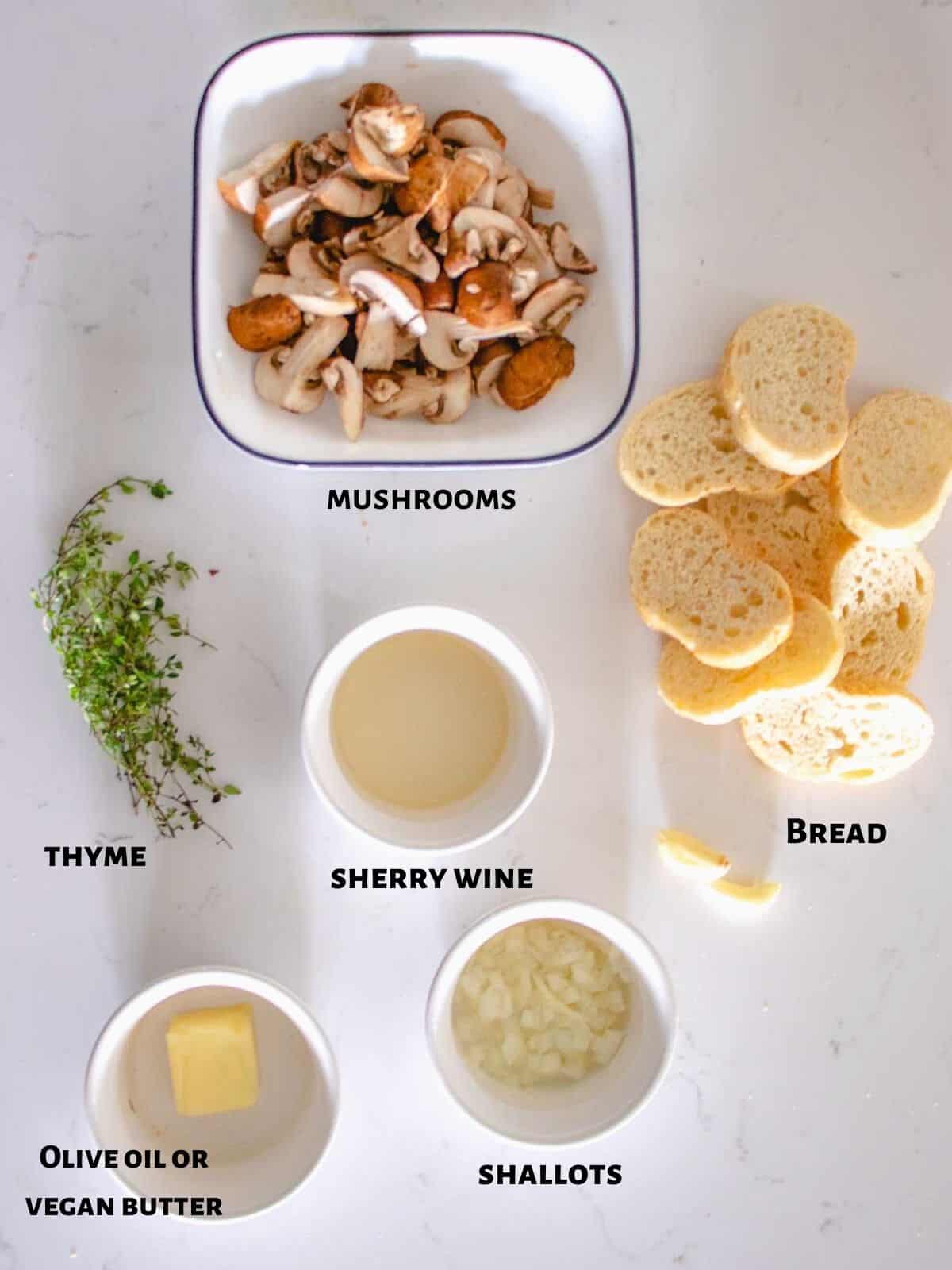 Vegan mushroom bruschetta ingredients on table.