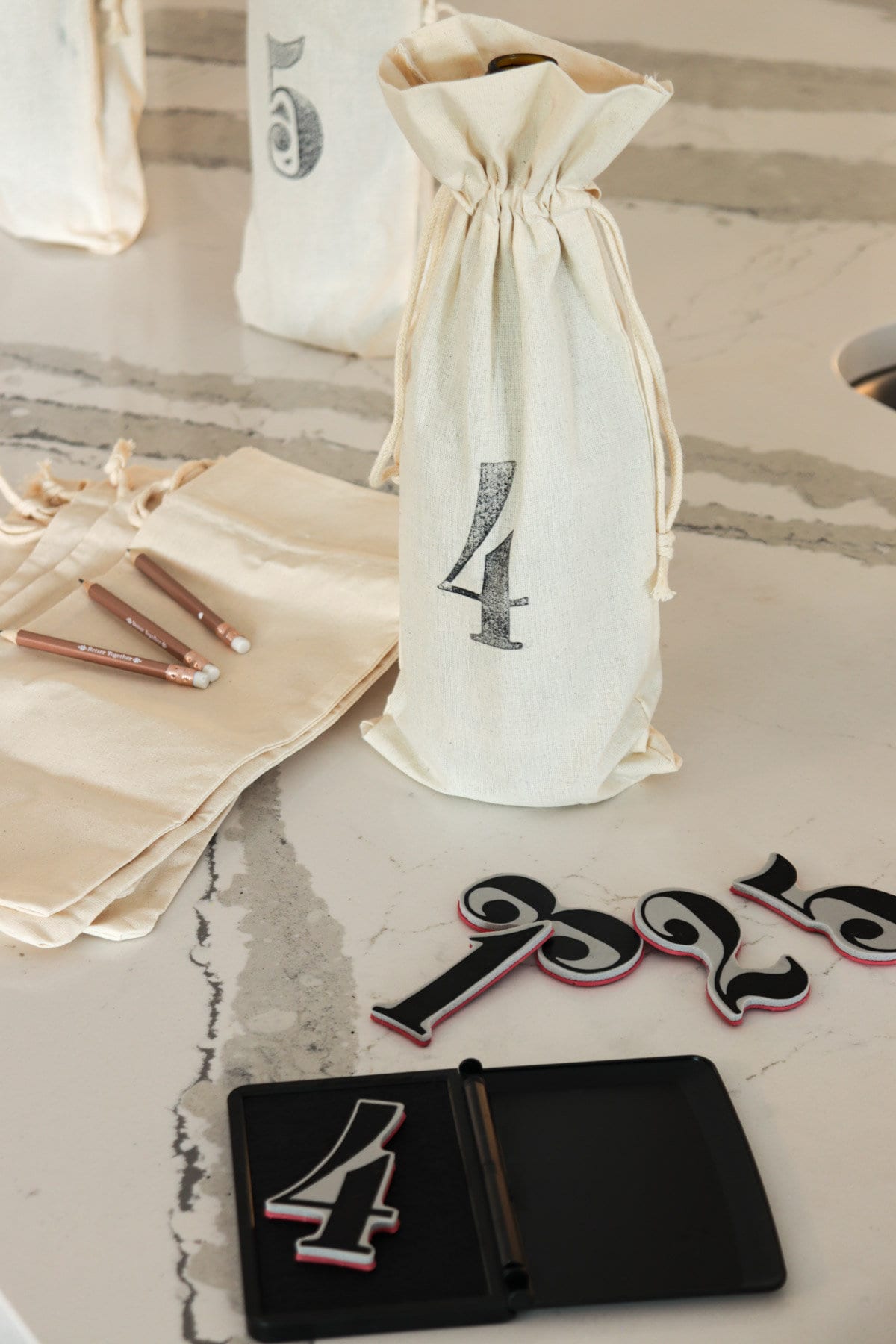 Wine bottle in bag with numbers and stamp.